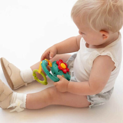 Juguete dinosaurio musical para bebé 16x15cm KioKids